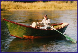 in his custom built 16' drift boat